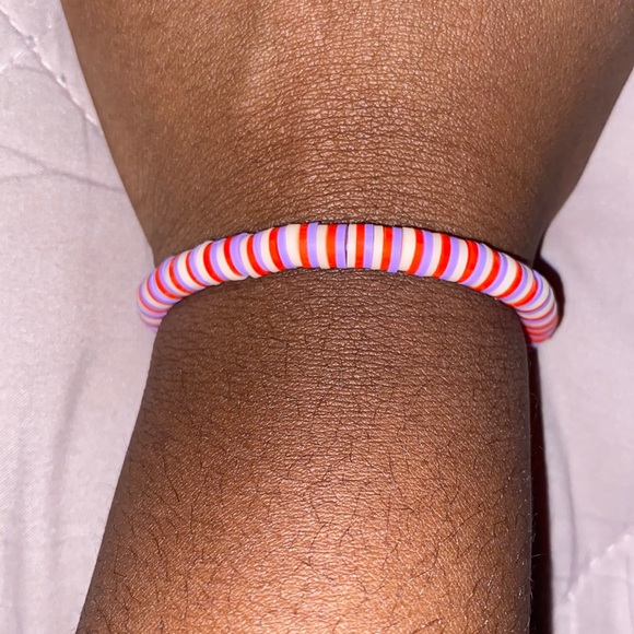 red, tan and purple bracelet - Picture 1 of 3